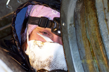 person cleaning ventilation